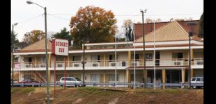 County approves $600,000 for purchase of Budget Inn